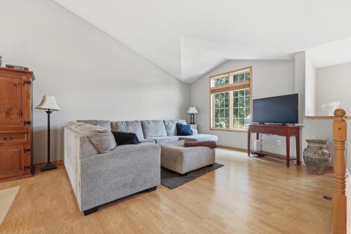 The Living room with large vaults creates an open and airy place to gather.