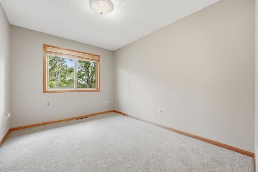 Upper level bedroom with large closet. there are three bedrooms on one level