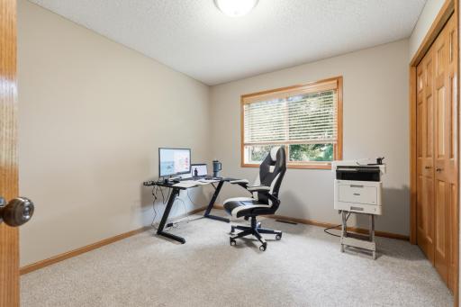 Upper level bedroom that is currently being used as an office