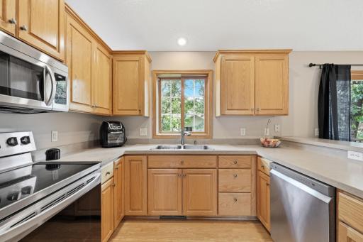 another view of the kitchen with updated stainless steel appliances