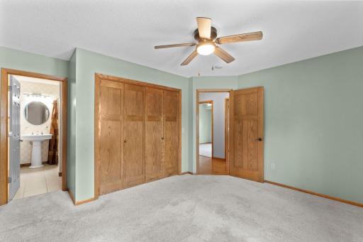 The primary bedroom has its own full ensuite bathroom.