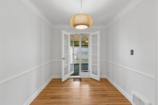 Charming dining space that walks out to screened in sunporch