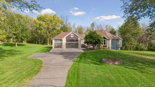 Welcome to 17830 N Diamond Lake Road! A distinctive, custom-designed one-story home set on 2.4 beautiful acres.