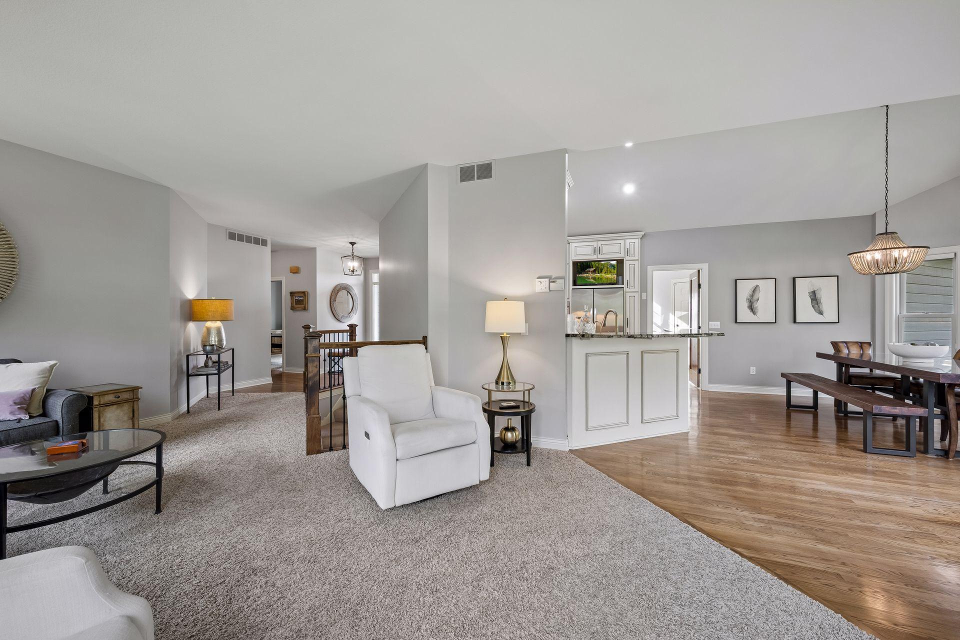 The open main-level layout creates a comfortable connection between the living, dining, and kitchen spaces.