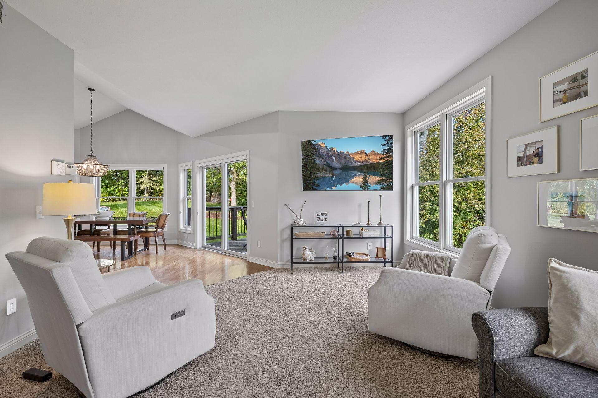 The living and informal dining areas connect easily, creating a natural layout for everyday living and entertaining.