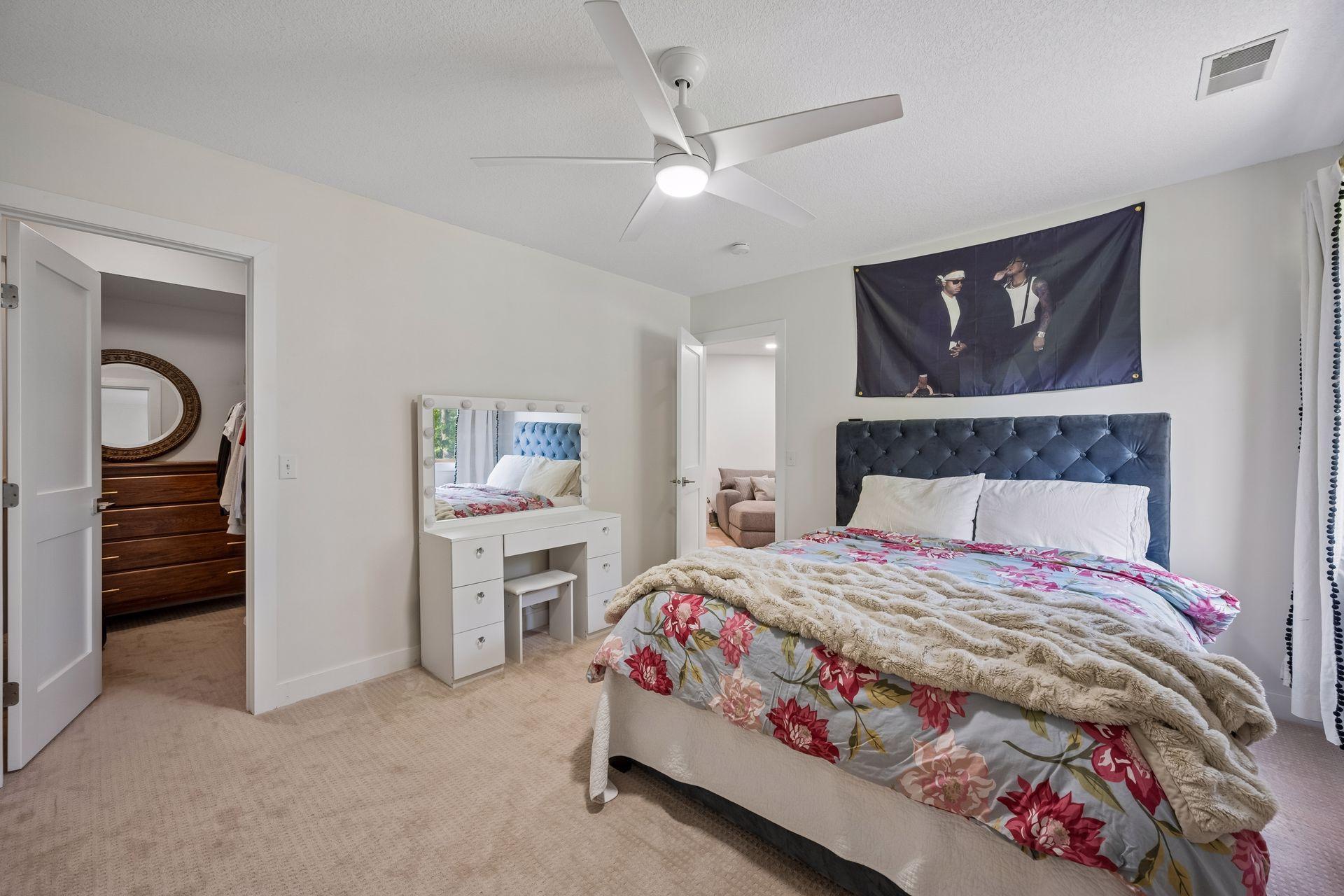 A second lower-level bedroom also features a walk-in closet and overlooks the backyard.