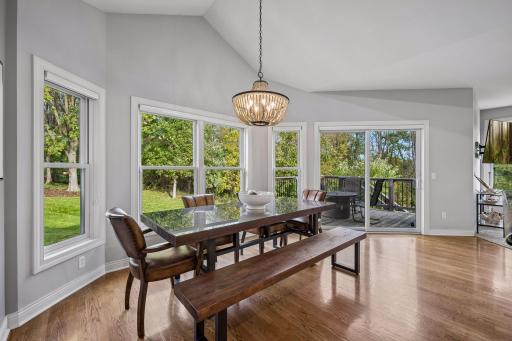 Gather for meals while enjoying abundant natural light and views of the surrounding greenery.