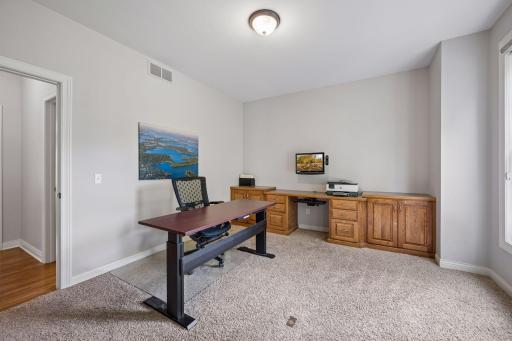 This flexible main-level room works beautifully as a home office, guest room, or bedroom.