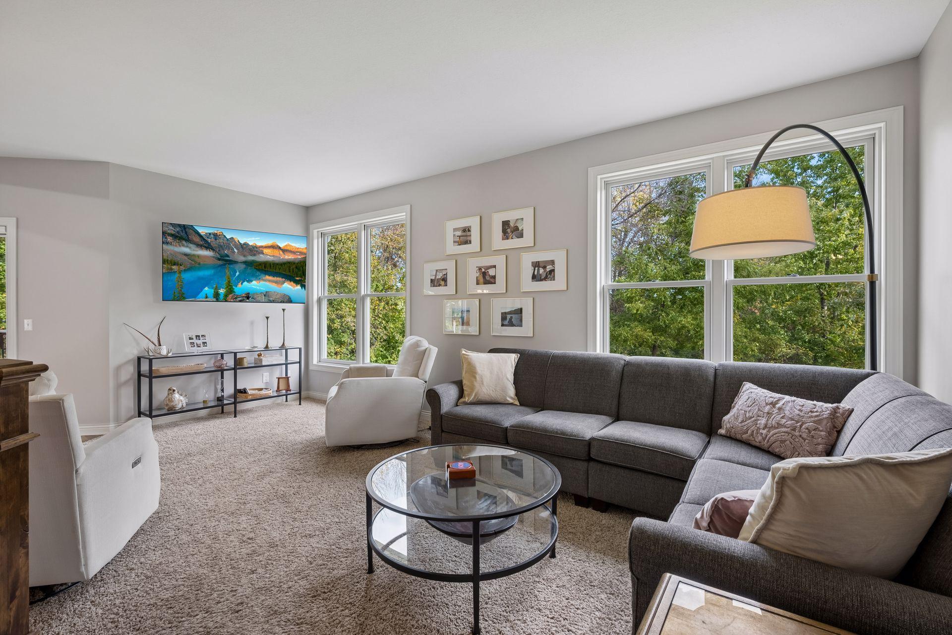 The comfortable living room offers an inviting space to relax and gather with family and friends.