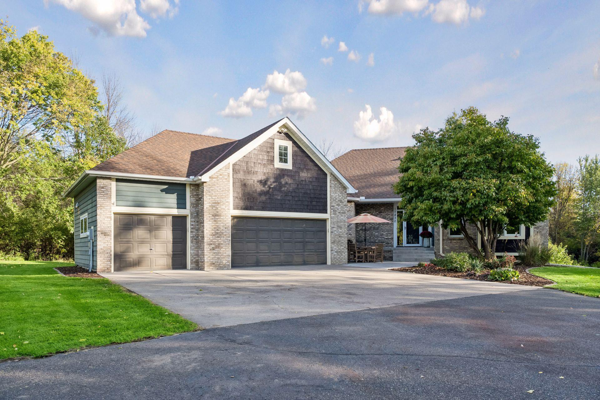 A closer look at the home’s distinctive design and heated, insulated three-car garage. Tesla super charger, Generac generator, and plenty of storage.