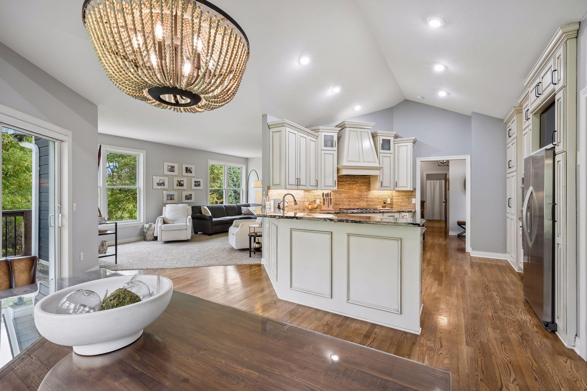 The kitchen’s open design keeps it connected to both the dining and living areas.