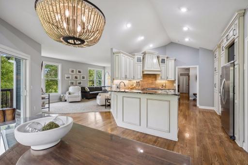 The kitchenâs open design keeps it connected to both the dining and living areas.