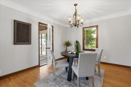 You may access the inviting three-season porch from the dining room.