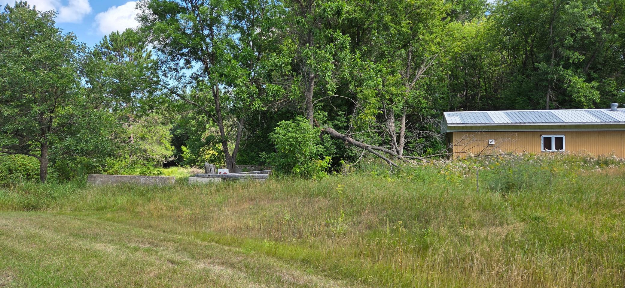 lot 1 trailer and concrete perimeter.jpg