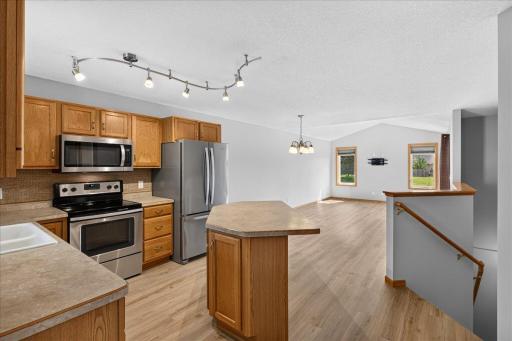 Kitchen open to dining and living room