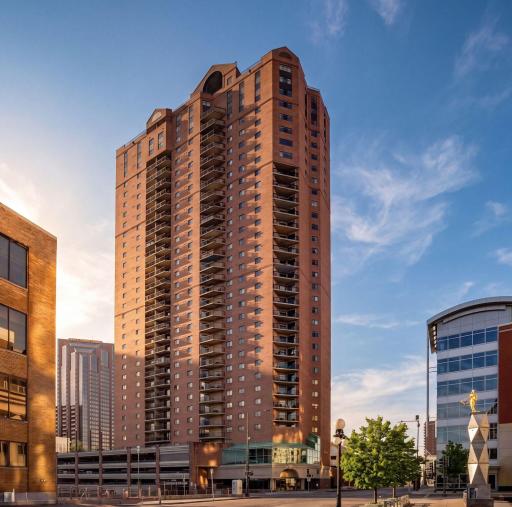 Exterior view of The Pointe of Saint Paul, a distinctive downtown high-rise condominium building.