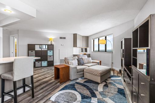 Wide view of the open-concept living and kitchen areas, ideal for everyday living and entertaining.