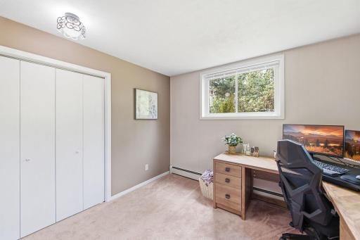 Additional view highlighting the closet, natural light and generous workspace.