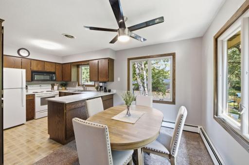 Dining space with abundant natural light and convenient access to the kitchen.