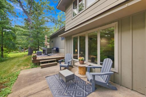 Backyard patio and 12x20 deck provide multiple areas for outdoor seating, grilling and entertaining.
