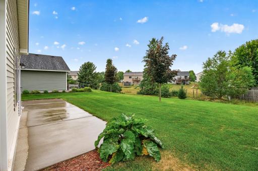 Expansive backyard with plenty of green space.