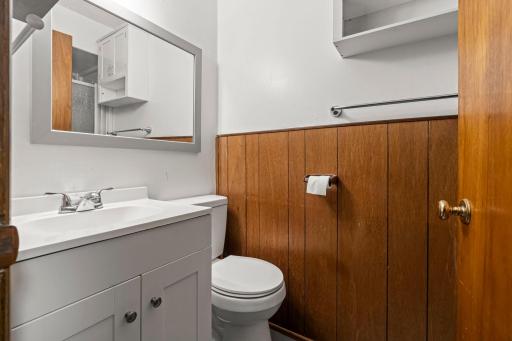The lower-level 3/4 bathroom features a single vanity and convenient walk-in shower.
