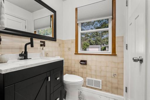 The updated ¾ bath with a convenient walk-in shower.