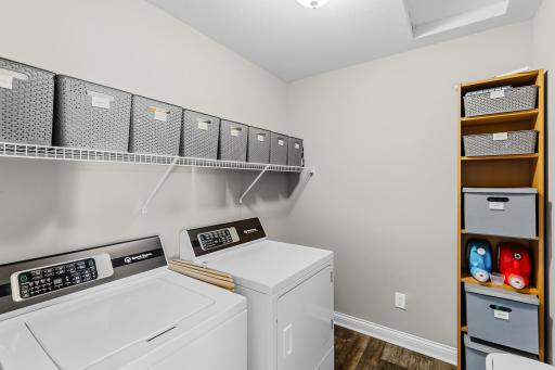 Upper level laundry room w/newer Speed Queen washer and dryer