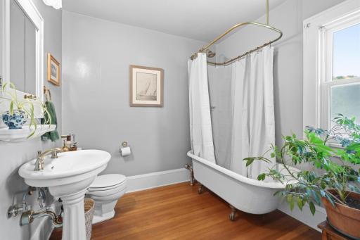Main upper bathroom includes a clawfoot tub