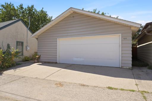 Oversized 2 car garage with separate storage room