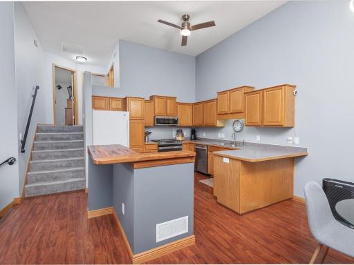 Center island prep space and counter breakfast bar.