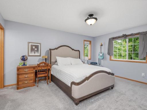 Owners suite with private bath and walk in closet with built in organizers.