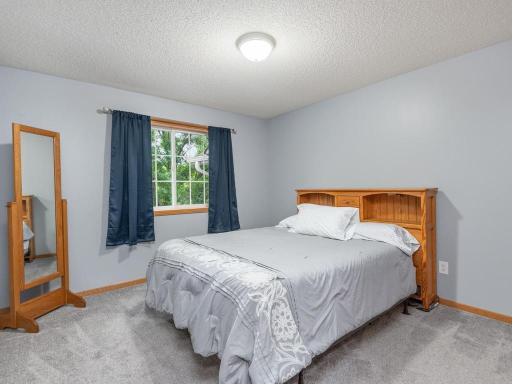 Secondary bedroom upstairs is spacious.