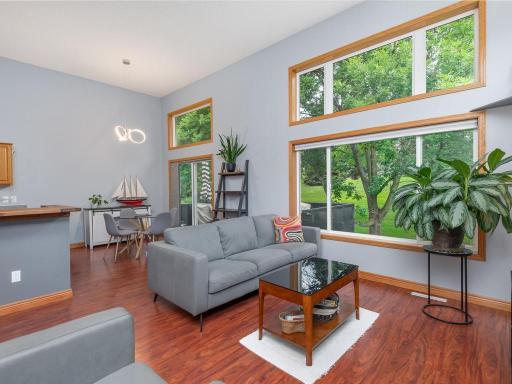 Living area and dining area. Patio walks out to the maintenance free deck.