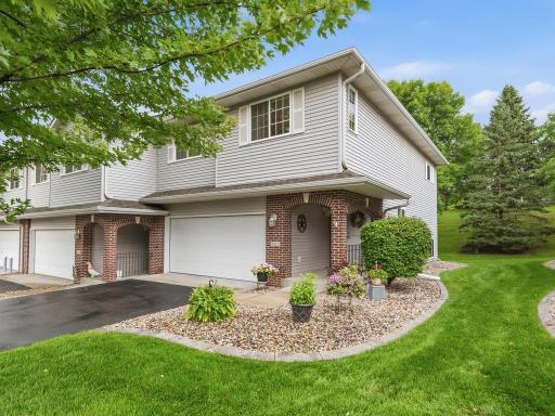Front of home. Low traffic street. Nice concrete edging. Covered entry. Driveway does not join to neighboring property : )