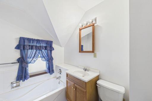Upper level bathroom has a nice tub for soaking and bathing kids!