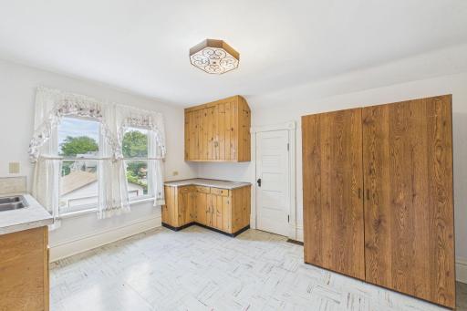 UPSTAIRS - When you come up the back stairs, this is your view! could be a second kitchen, craft room, bedroom or more! It