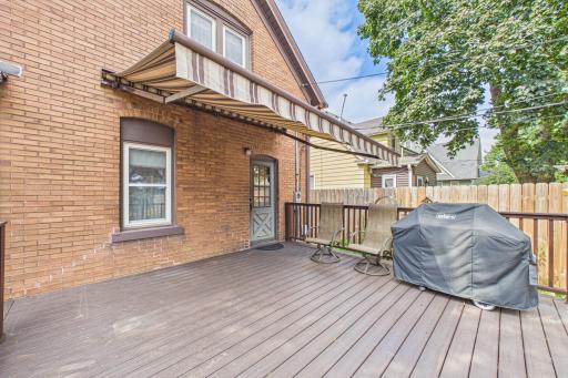Another angle of the spacious low-maintenance deck! Note the retractable awning!