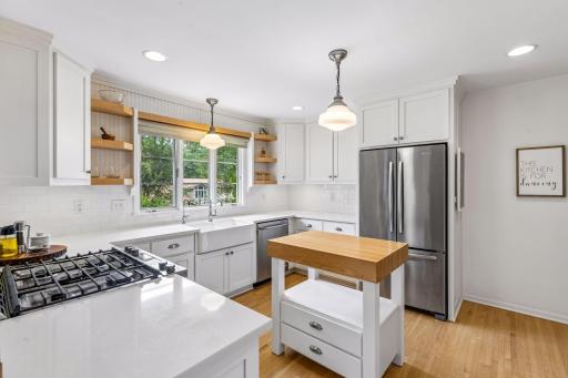 Kitchen with gas range.