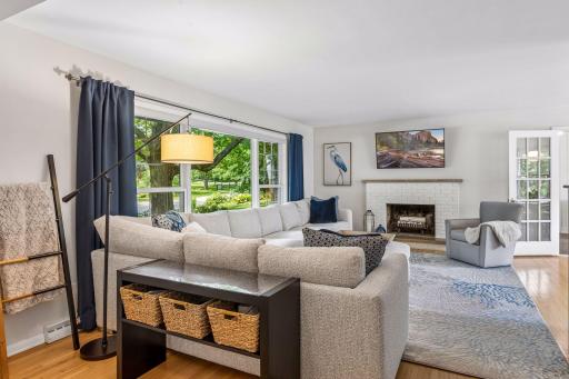 Spacious living room with hardwood floors and nice southern exposure.