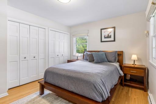 Primary bedroom with his and her closets.