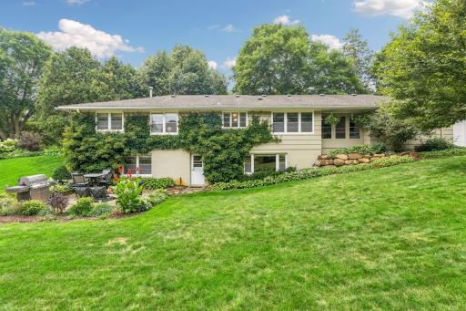 Spacious backyard with patio.