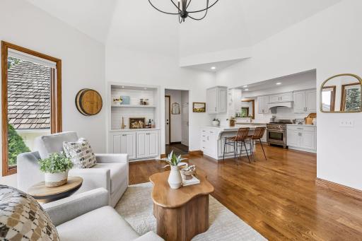 From the comfortable seating area to the well-appointed kitchen, this open gathering space keeps everyone connected while still giving each area its own sense of purpose.