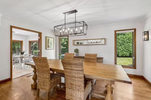 Dinner parties feel right at home here, with generous space for gathering and views of the surrounding greenery adding a relaxed touch to more formal occasions.