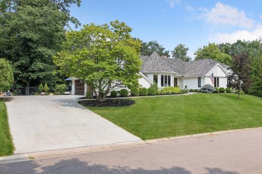 Oversized 3 car garage and a new concrete driveway with spacious guest parking