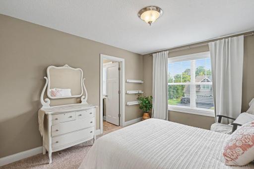 Third bedrooms on the upper level with a private bathroom