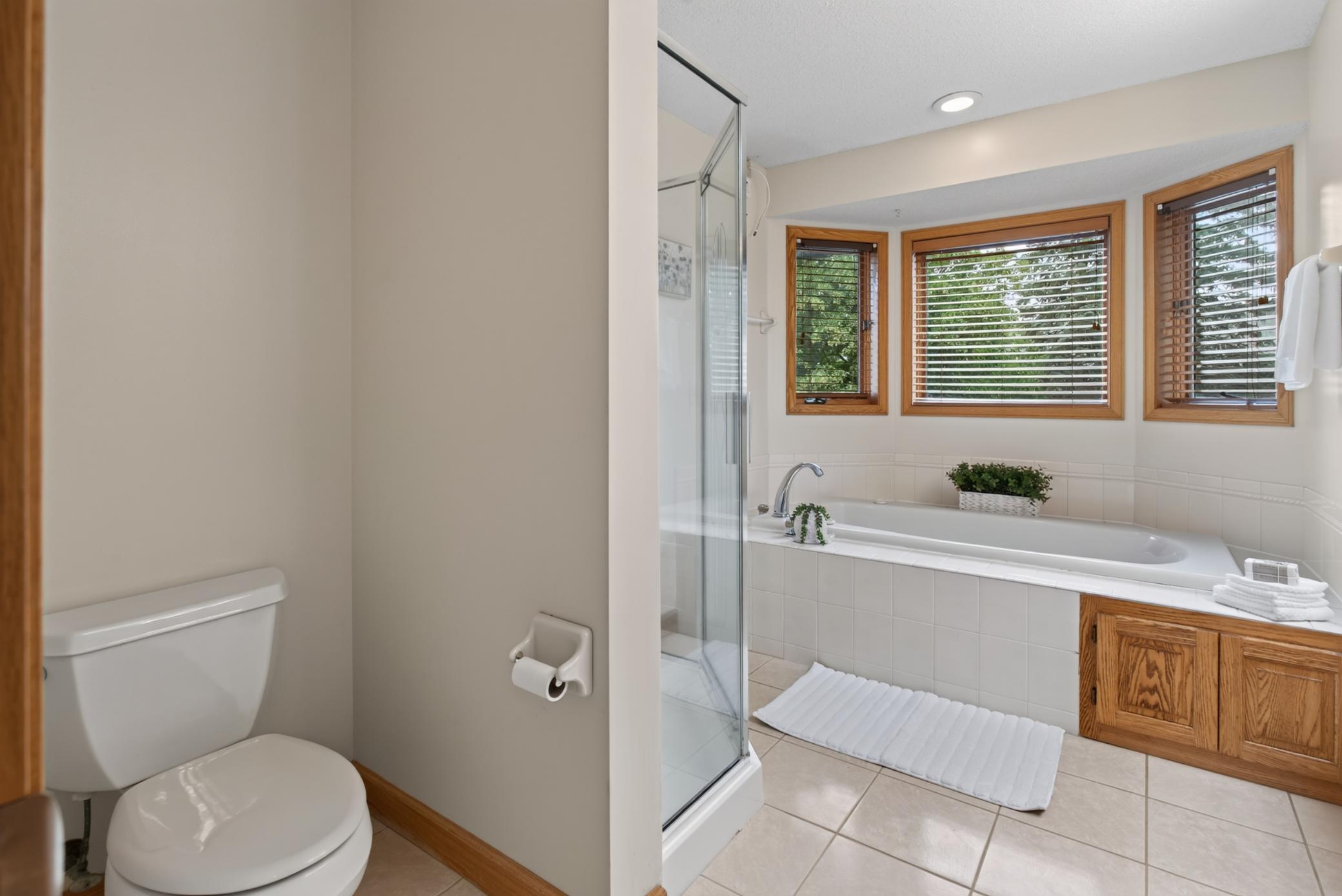 Primary Suite Full Bathroom with Whirlpool