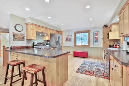 Updated kitchen with Alder cabinets and tile backsplash