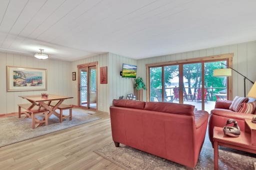 Living Room with sliding glass door to lakeside deck