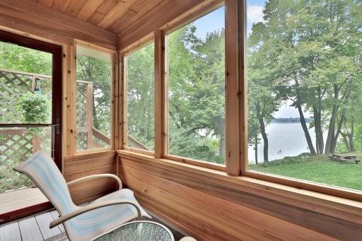 Screened Porch has door to back yard and lakeside